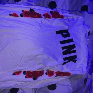 From pink, with flower on sleeve